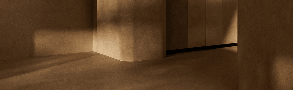 Sunlit architectural concrete structure with sweeping curves